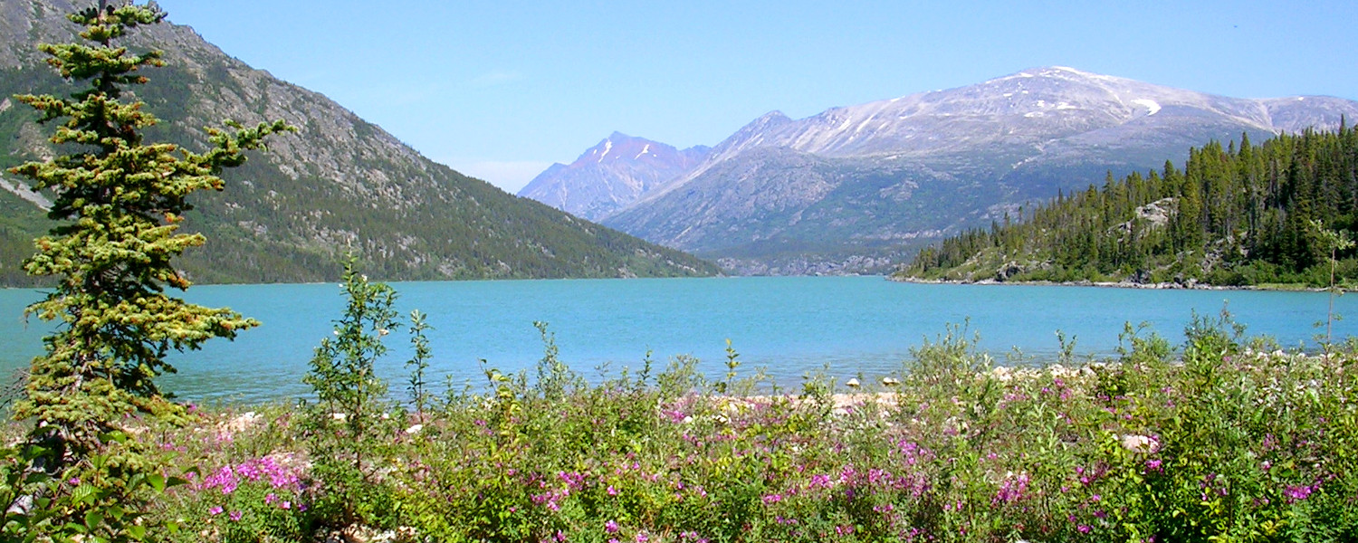Backpackers are treated to stunning views of the Yukon's alpine lakes.